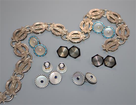 A late 19th century engraved white metal circular link book chain, two pairs of cufflinks including sterling and six buttons.